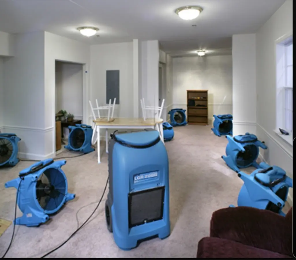 Air movers and dehumidifier setup for Water Damage Restoration in Travilah